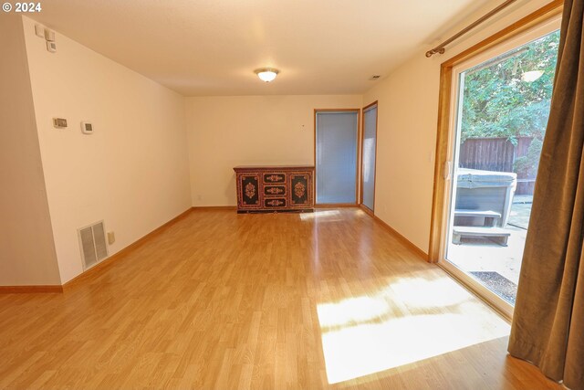 3794 Wilshire Ln, Eugene, OR 97405 - unfurnished room with light wood finished floors and baseboards