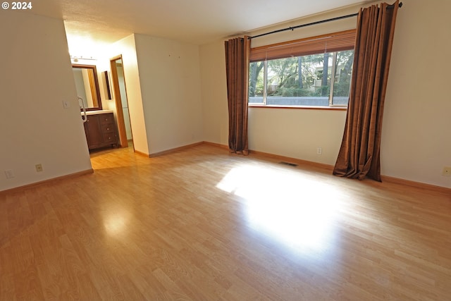 3794 Wilshire Ln, Eugene, OR 97405 - empty room with light wood finished floors and baseboards