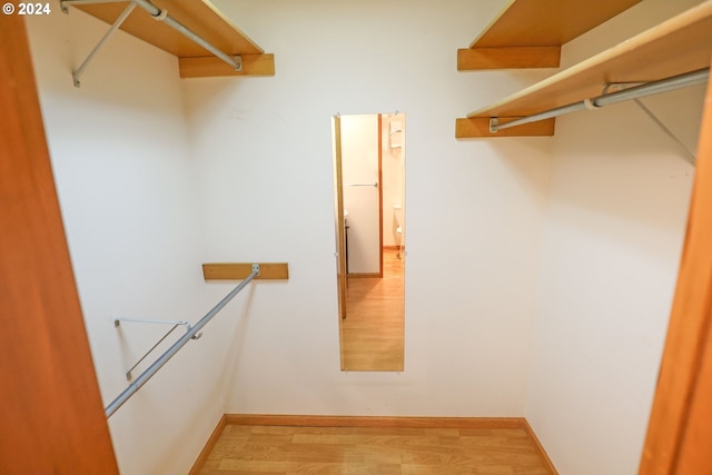 3794 Wilshire Ln, Eugene, OR 97405 - walk in closet with wood finished floors