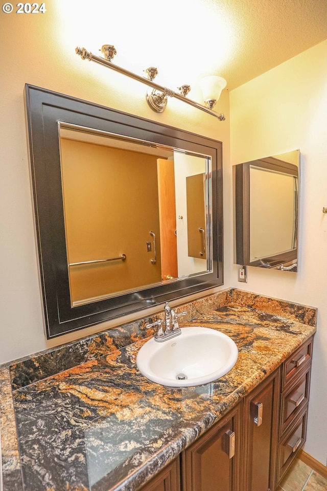 3794 Wilshire Ln, Eugene, OR 97405 - bathroom featuring vanity and tile patterned floors