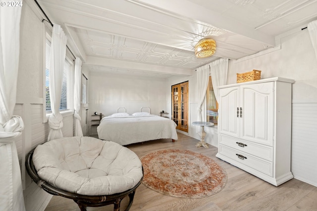 bedroom featuring wood-type flooring