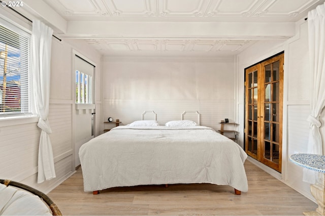 bedroom featuring light wood-type flooring