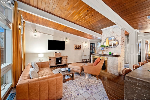 living room with beamed ceiling, hardwood / wood-style floors, and wooden ceiling