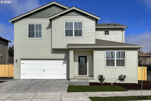 view of front of property with a garage