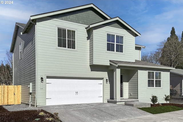 view of front of home with a garage