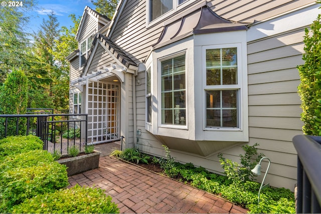 entrance to property with a patio