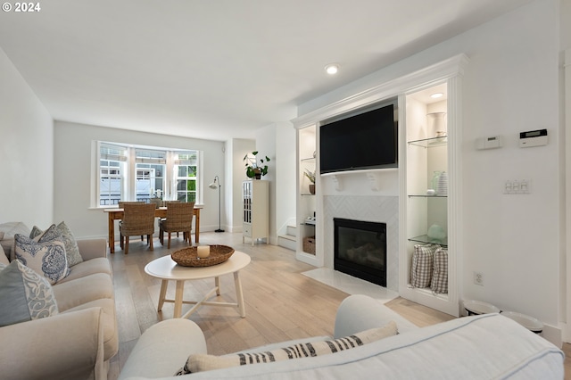 living room with light hardwood / wood-style floors