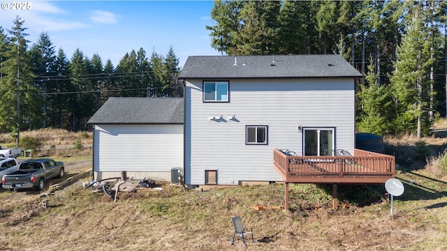 rear view of house with a deck