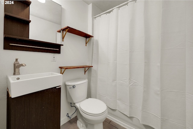 full bathroom with vanity, toilet, and shower / bath combo with shower curtain