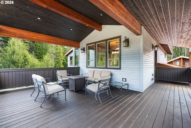 deck with an outdoor fire pit