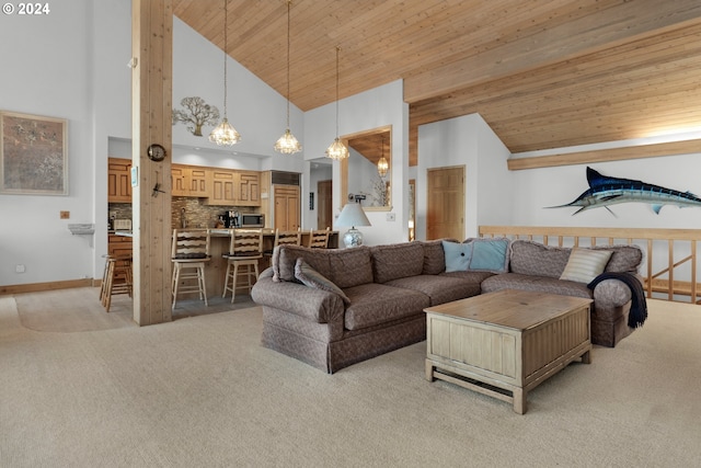 79274 Ray Brown Rd, Arch Cape, OR 97102 - living room featuring light colored carpet, wood ceiling, and high vaulted ceiling