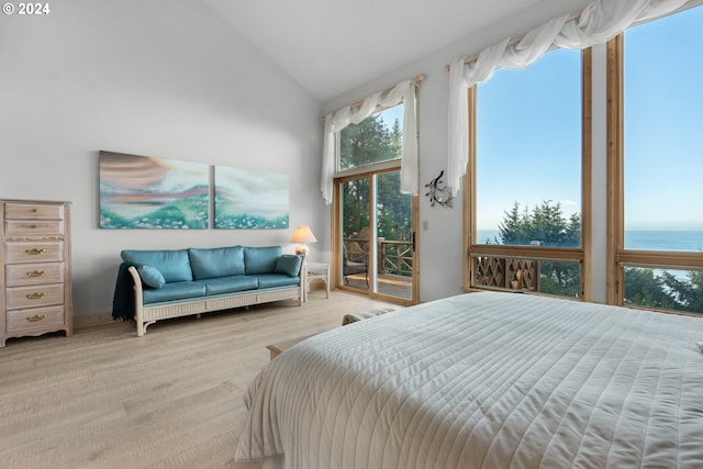 79274 Ray Brown Rd, Arch Cape, OR 97102 - carpeted bedroom with access to outside, a water view, and high vaulted ceiling