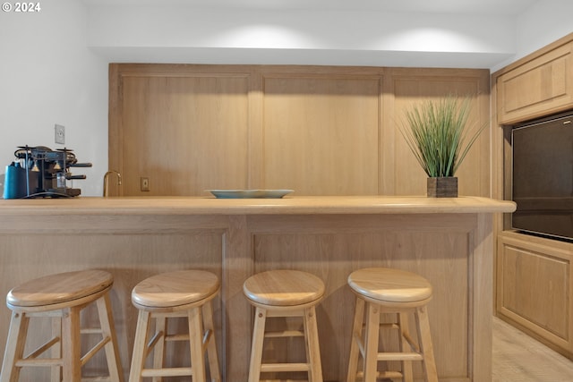 79274 Ray Brown Rd, Arch Cape, OR 97102 - bar featuring light brown cabinetry