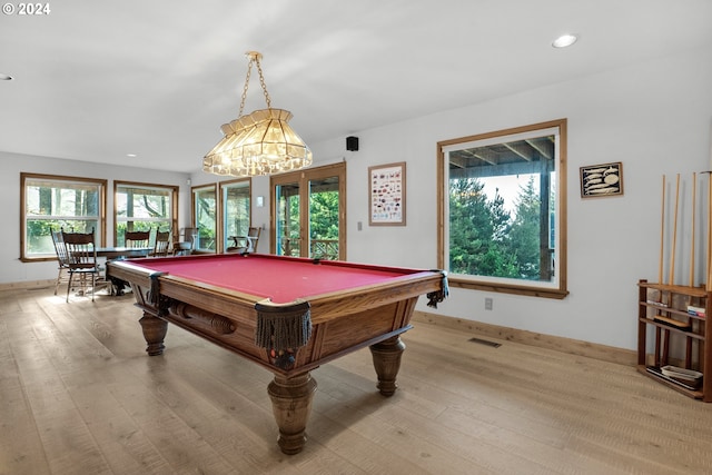 79274 Ray Brown Rd, Arch Cape, OR 97102 - recreation room featuring a chandelier, light hardwood / wood-style flooring, a healthy amount of sunlight, and billiards