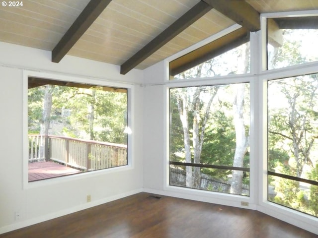 unfurnished sunroom with wooden ceiling, lofted ceiling with beams, and a wealth of natural light