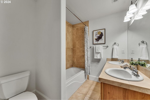 full bathroom featuring tile patterned floors, baseboards, toilet, and a sink