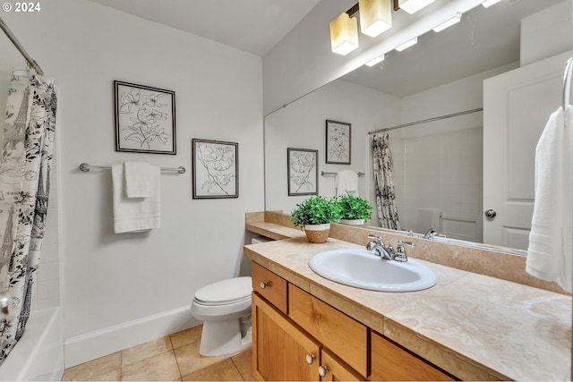 full bathroom featuring tile patterned flooring, shower / bath combination with curtain, toilet, vanity, and baseboards