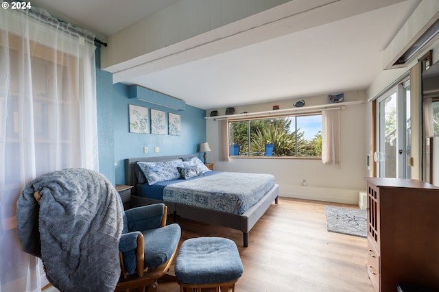 bedroom with light hardwood / wood-style floors