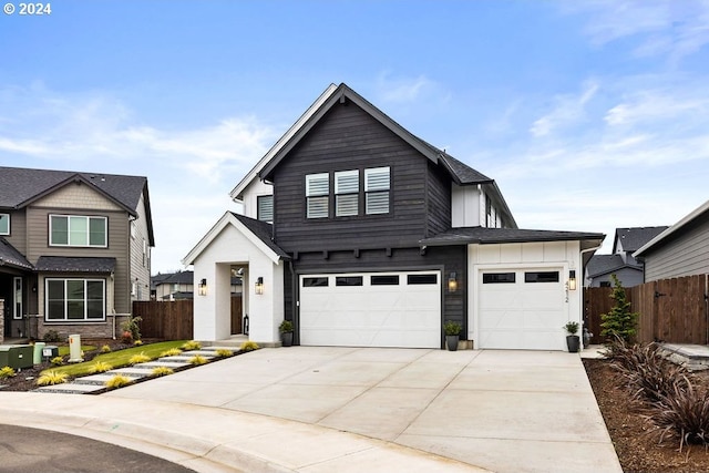 modern farmhouse style home featuring a garage