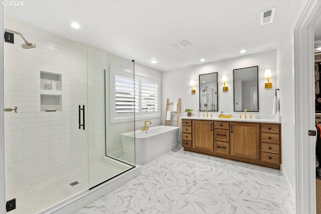 bathroom with tile floors and independent shower and bath