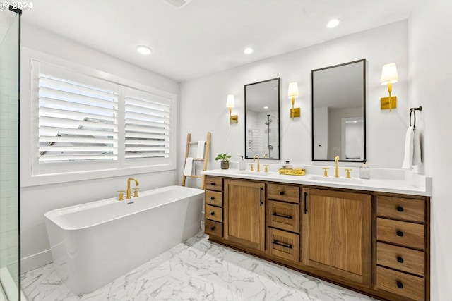 bathroom featuring vanity with extensive cabinet space, a washtub, dual sinks, and tile floors