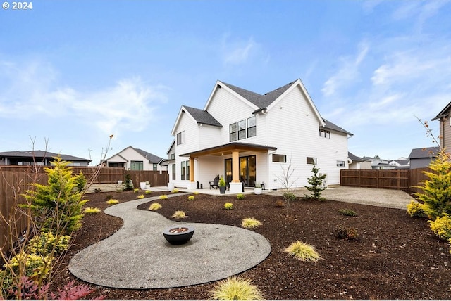 rear view of house with a patio area