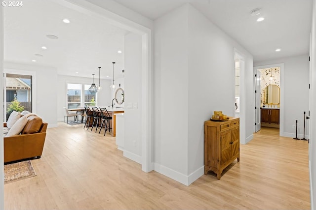 corridor featuring light wood-type flooring