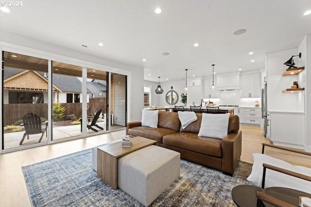 living room with light hardwood / wood-style floors