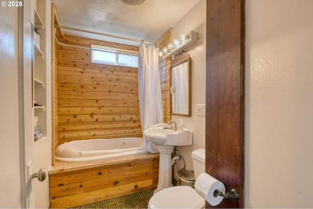 full bathroom featuring shower / tub combo with curtain, tile patterned floors, and toilet