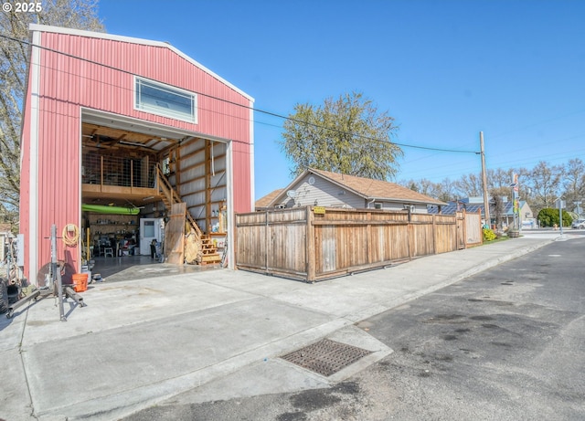 garage with fence