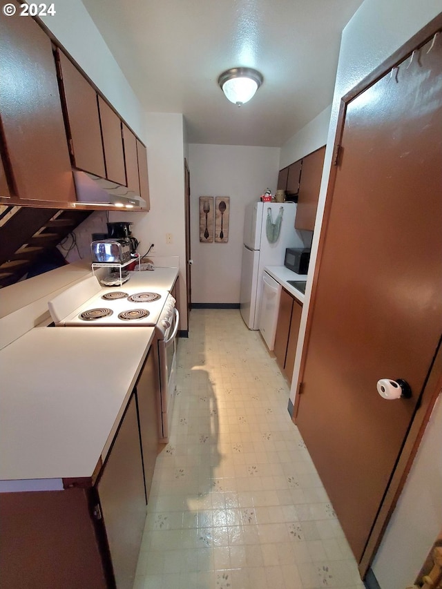 kitchen featuring white appliances