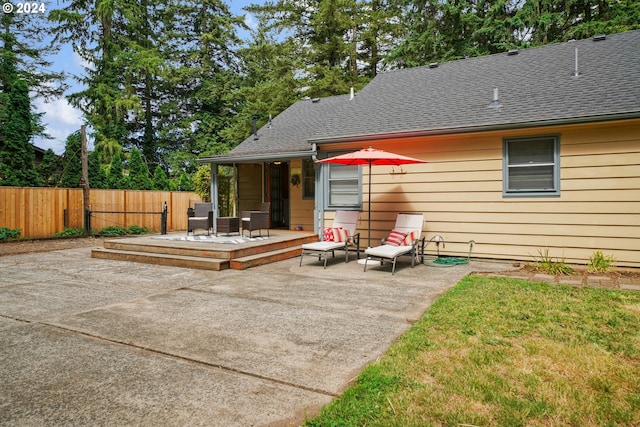 rear view of house featuring a patio