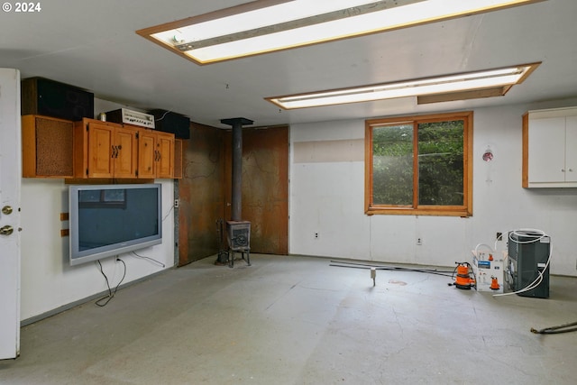 basement featuring a wood stove