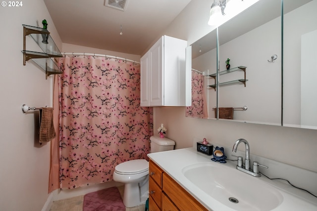 full bathroom with vanity, shower / tub combo, and toilet