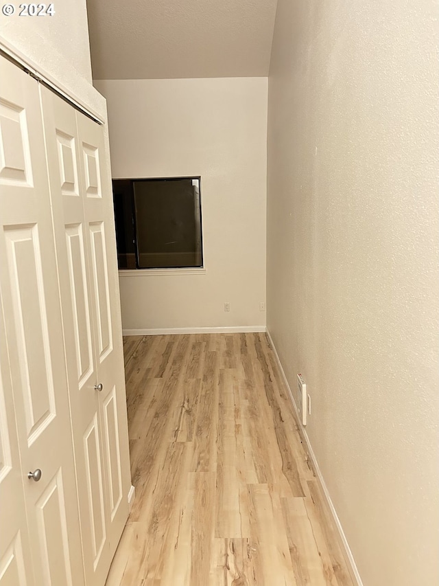 hall featuring light wood-type flooring