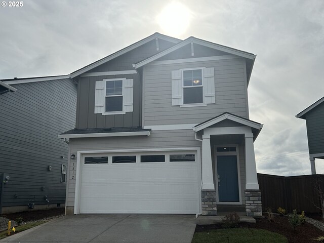 craftsman house with a garage