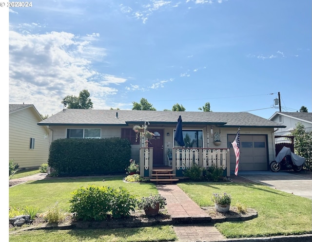 ranch-style home with a front lawn and a garage