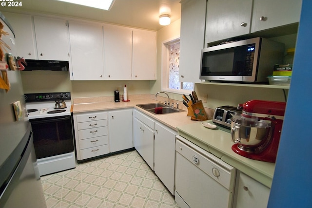 kitchen with ventilation hood, white cabinets, white appliances, and sink