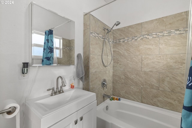 bathroom featuring vanity and shower / bath combo with shower curtain