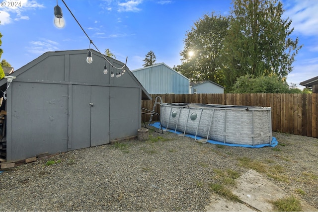 view of outdoor structure with a covered pool