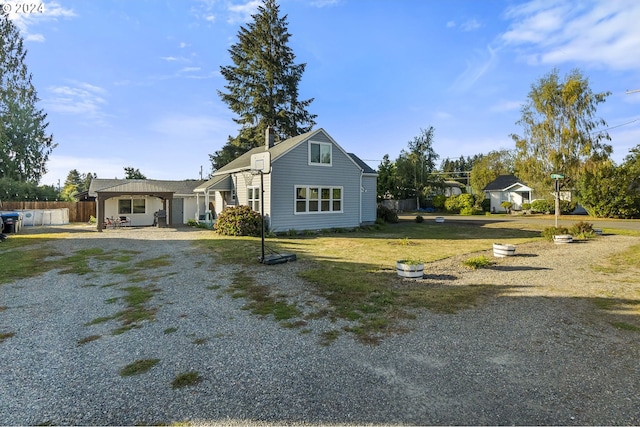 view of front of home featuring a front yard