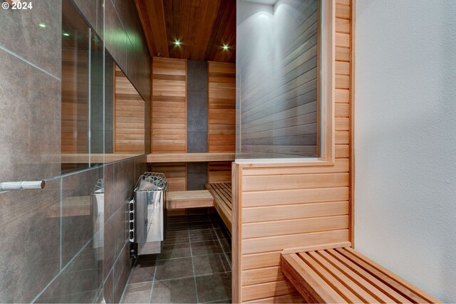 view of sauna featuring wooden ceiling