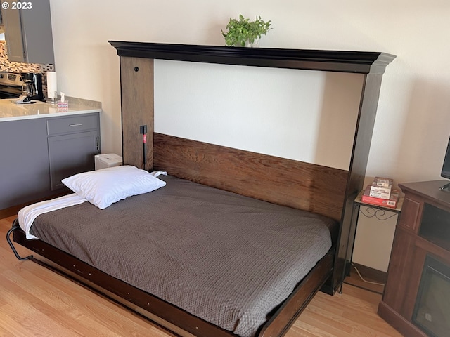 bedroom featuring light hardwood / wood-style flooring