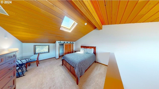 bedroom with light colored carpet, visible vents, vaulted ceiling with skylight, wooden ceiling, and baseboards