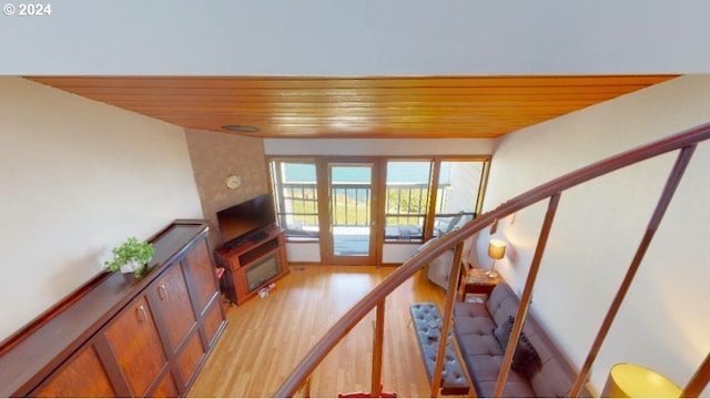 interior space featuring wood finished floors and wood ceiling