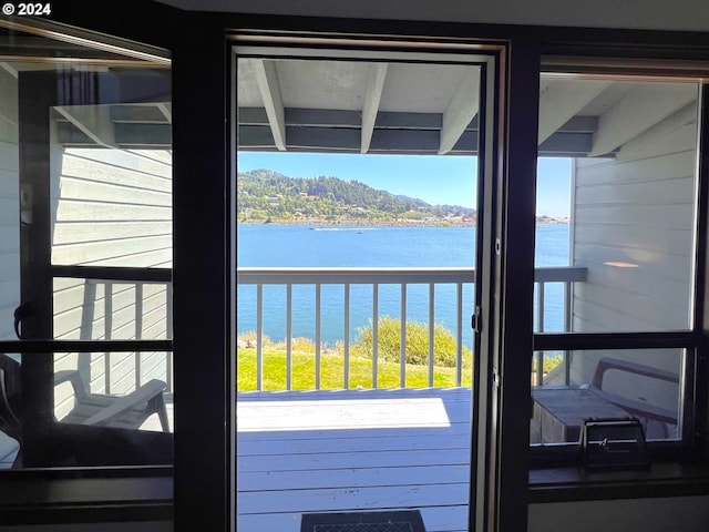 entryway featuring a water view