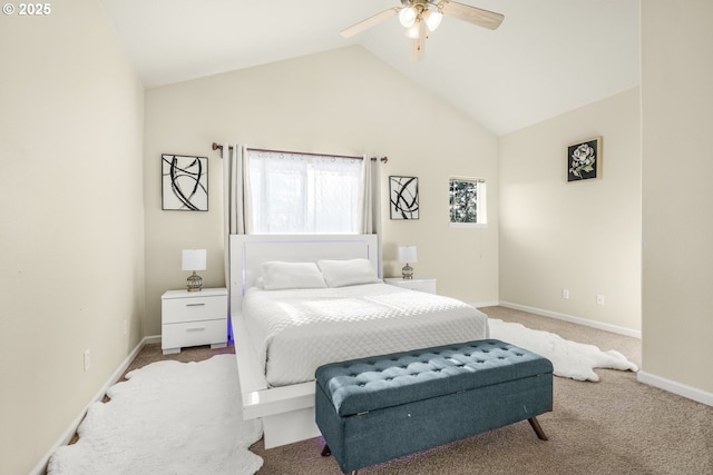 carpeted bedroom featuring ceiling fan and vaulted ceiling