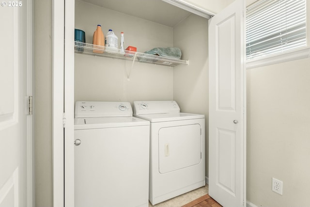 laundry area featuring washing machine and dryer