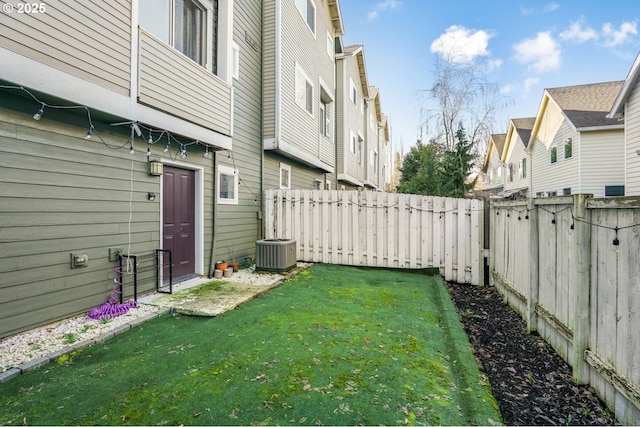 view of yard featuring central AC