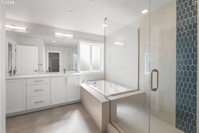 bathroom with vanity, shower with separate bathtub, and tile patterned floors